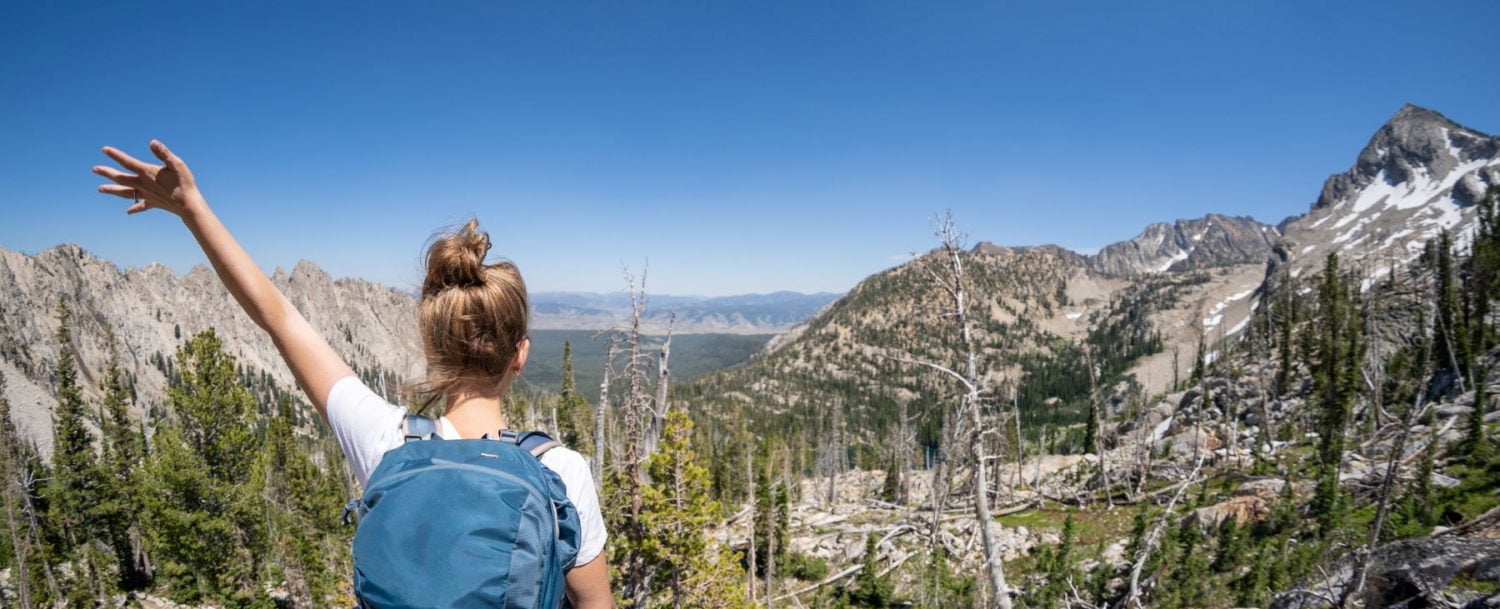 a girl hiking in the Sawtooth Mountains Idaho